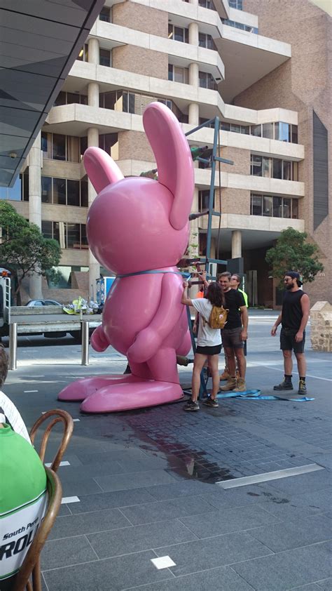 A Giant Faceless Pink Rabbit Is Being Asphyxiated At Westralia Square