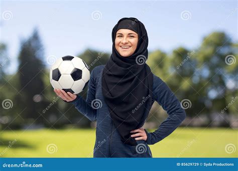happy muslim woman in hijab with football stock image image of fitness person 85629729