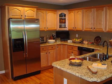To make your kitchen look bigger, match your honey oak cabinets with the same color, or similar color, flooring. complimentary color for oak cabinets - Google Search ...