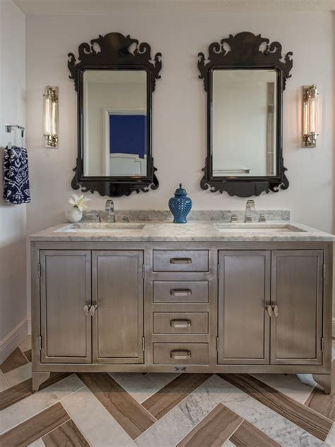 Craftsman style bathroom designs that uses period pieces such as wall sconces, bronzed vanity hardware and tile molding can make a big impression. Industrial Vanity Home Design Ideas, Pictures, Remodel and ...