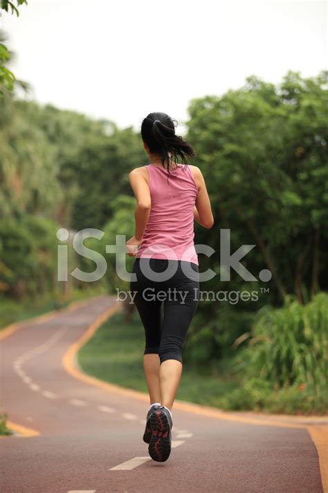 Runner Athlete Running On Forest Trail Stock Photo Royalty Free