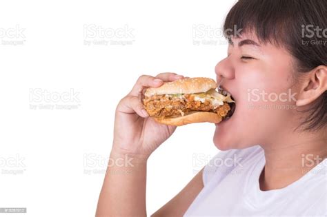 Fat Asian Woman Eating Fried Chicken Hamburger Isolated On White Food And Healthcare Concept