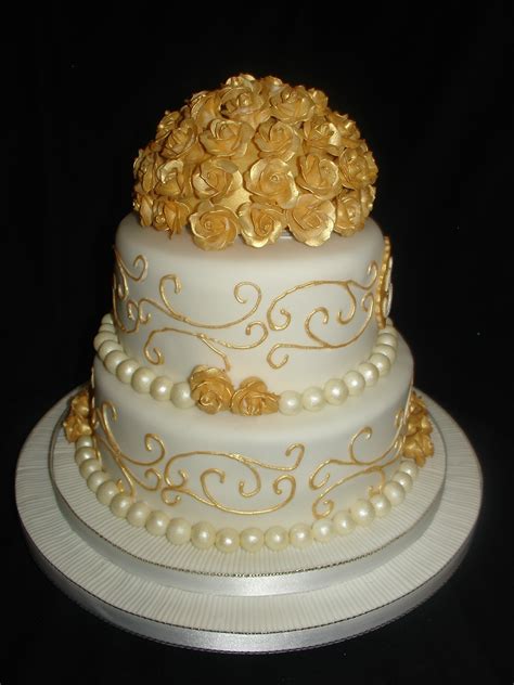 Your wedding day is one of the most important days of your life, so of course you want everything to be just right, especially the cake. Golden (50Th) Wedding Anniversary Fondant Cake - CakeCentral.com