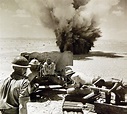 North African Campaign. An enemy shell landing close to a 6-pounder ...