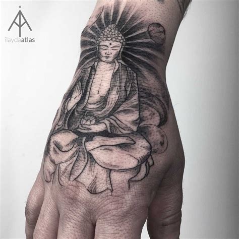 Buddha Tattoo Inked On The Right Hand By Ilayda Atlas Buddha Tattoo