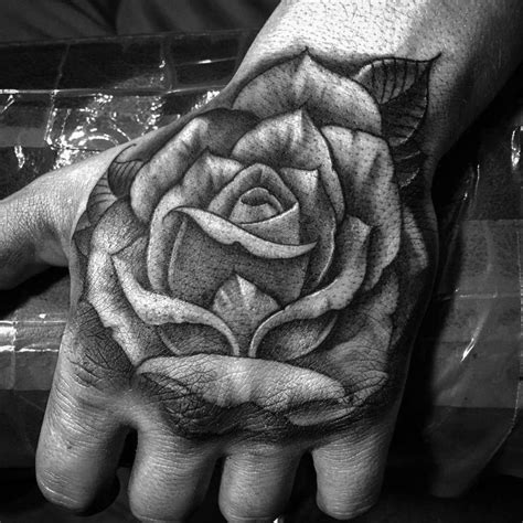 For some people, choosing a tattoo location involves finding a place easy to cover. Freehand Rose Hand Tattoo by Sir Twice: TattooNOW
