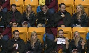 Most Awkward Kiss Cam Ever As Man Unfolds My Sister Sign At Minnesota Gophers Game Daily