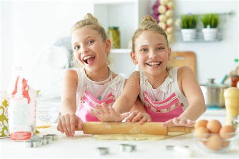 portrait of a two sisters in the kitchen stock image image of cheerful daughter 125226043