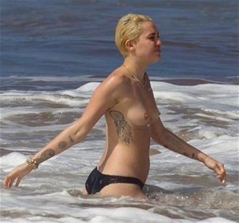 Miley Cyrus Tattoos And Topless At The Beach In Hawaii Sexy Photo My
