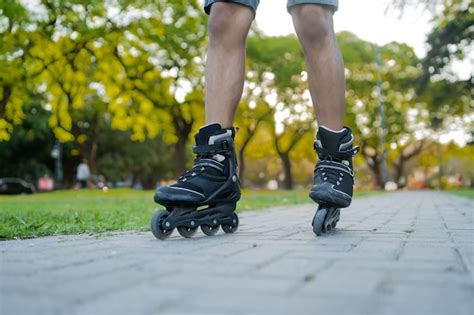 Premium Photo Close Up Of A Man Rollerskating Outdoors On The Street