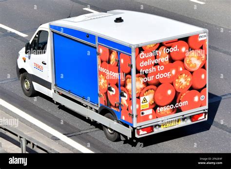 Aerial Top Side And Back Of Tesco Supermarket Van A Food Supply Chain