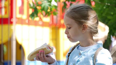 Lovely Young Person Enjoying Snack In Park Stock Footage Sbv 323976392