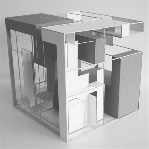 An Architectural Model Of A House Made Out Of Paper
