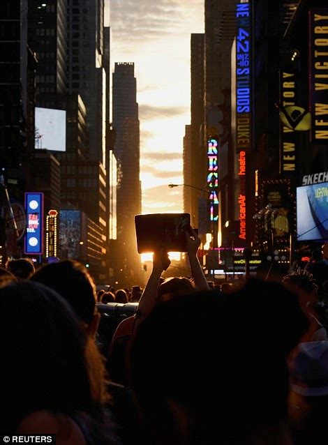 Manhattanhenge Sets The City Alight As New Yorkers Gather To Marvel At
