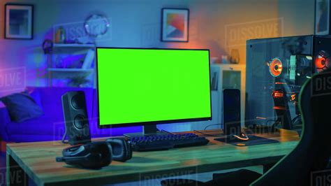 powerful personal computer gamer rig  mock  green screen monitor stands   table