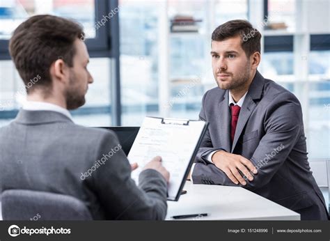 Businessmen At Job Interview Stock Photo By ©dmitrypoch 151248996