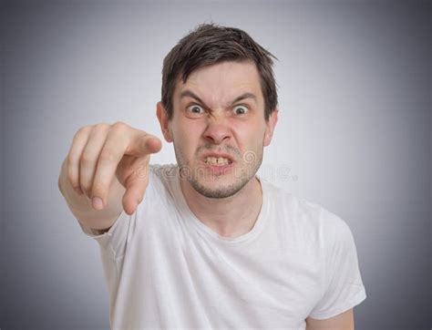 Angry Young Man Is Pointing Towards You Stock Photo Image Of Human