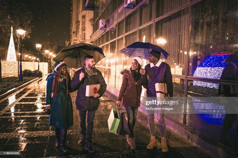 Diverse Group Of People Christmas Shopping High Res Stock Photo Getty
