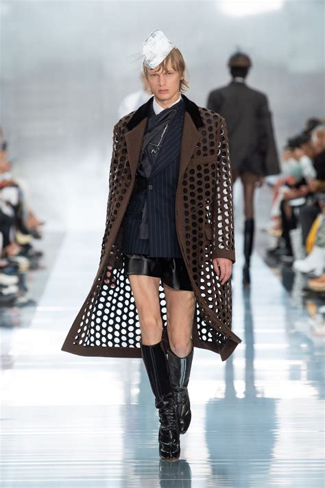 For the designer's spring/summer 2020 show, leon dame closed the show wearing a black belted jacket, cadet hat and knee boots. PFW: Maison Margiela Spring/Summer 2020 Collection - PAUSE ...
