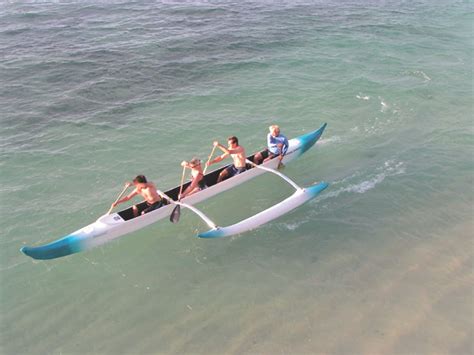 The Sic Malana Outrigger Canoe At Stand Up Paddle Surfing In Hawaii