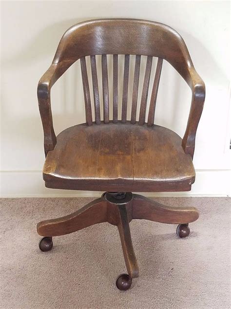 Armless wooden banker chair is entirely designed with high quality and sturdy materials. Vintage Antique Barrel Oak Wood Swivel Office Bankers ...