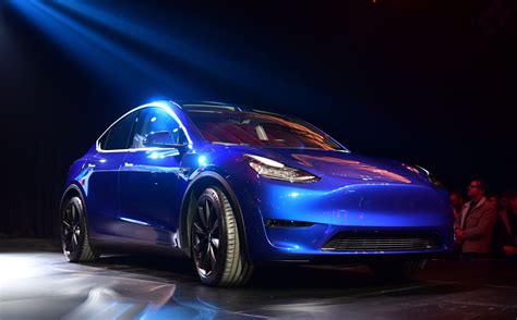 Tesla Shows Off Model Y In Deep Blue Metallic Paint Outside Seat Factory