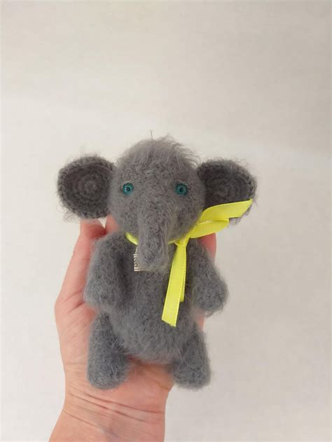 The wire elephant measures 12.8h x 9.6w with 1.5 depth and is finished in a modern metallic grey wire color. Mini Crocheted elephant gift for kids Kids Room Decor Knit ...