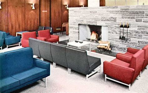 Mid Century Modern Seating Arrangement Around A Large Stone Fireplace
