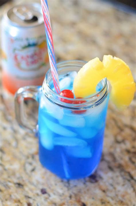 The Mandarin Malibu Blue Recipe Drinks With Pineapple Juice Malibu Blue Malibu Rum