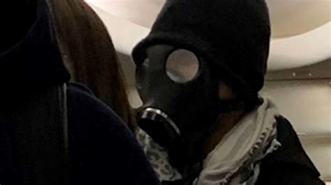 Passenger Wearing Gas Mask Panics People On American Airlines Flight In