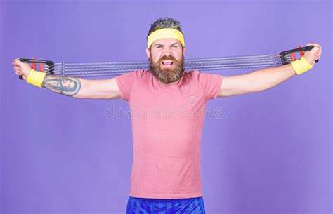 Lets Stretch Arms Athlete Stretching With Expander Man Bearded Athlete Exercising With