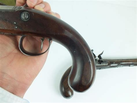 A Cased Pair Of 25 Bore Flintlock Duelling Pistols By Robert Wogdon