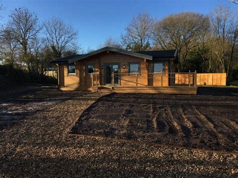 At uk log cabins we are delighted to be offering a fabulous range of residential log cabin homes you'll love to live in. residential_cabin_in_wales | Residential log cabins, Cabin ...