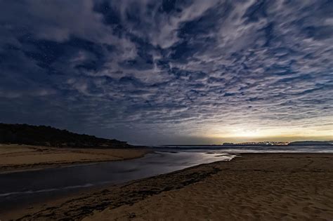 Clouds And Stars Nightscape At The Beach Photograph By Merrillie Redden Pixels