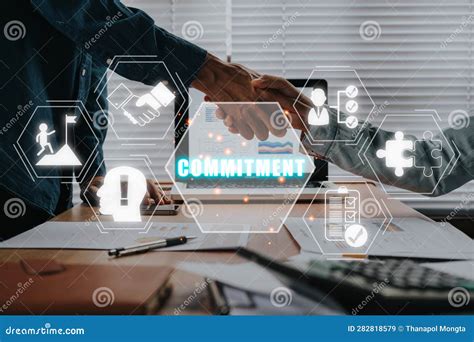 Business Partnership Handshaking after Perfect Deal with Commitment