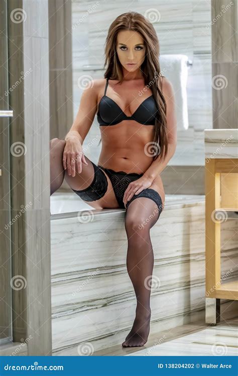 Gorgeous Brunette Model Relaxing At Home In Lingerie Stock Photo Image Of Break Boudoir