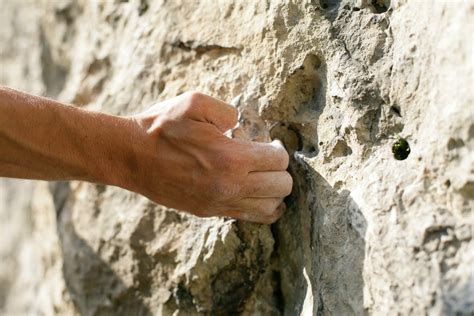 Man Hand Holding Rock · Free Stock Photo