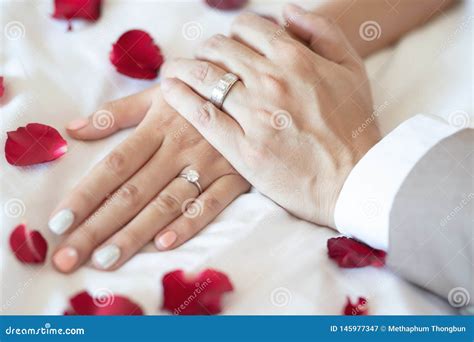 Close Up Hand Groom Couple Lovers Show Wear The Wedding Ring On Bride