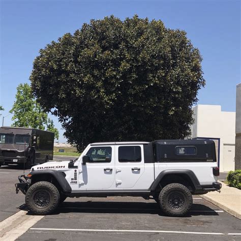 Fiftyten kit makes jeep gladiator a go anywhere adventure camper. (2020+) Jeep Gladiator Cap/Canopy | RLD Design USA