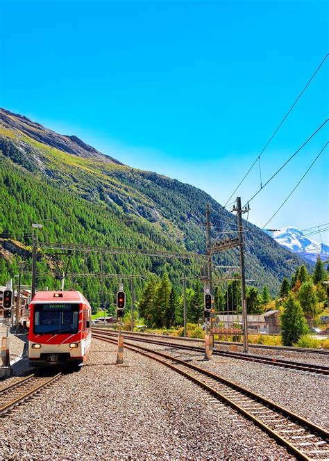 Train At Railway Station In Zermatt Switzerland Stock Image Image Of