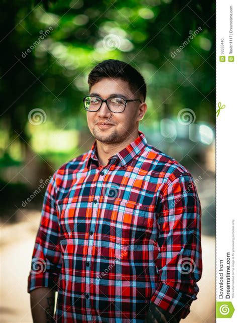 Most single men who lives on their own gets a bachelor's pad. Handsome Young Man On Nature Background Stock Photo ...