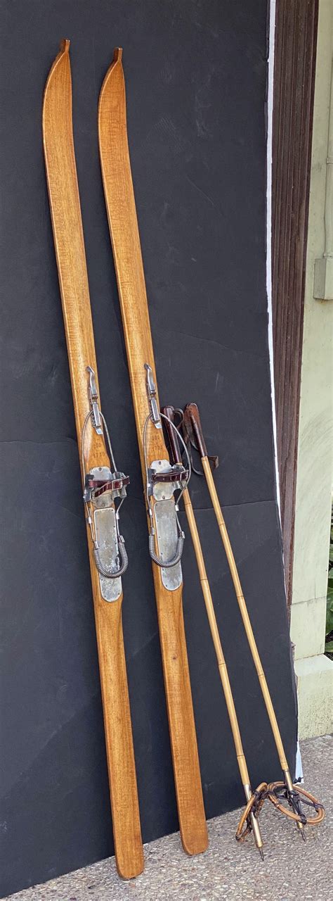 Pair Of Vintage French Wooden Skis With Bamboo Skiing Poles At 1stdibs