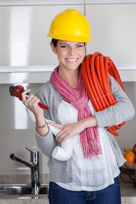 Plumber Woman Sitting Fixing The Pipe Stock Photo Image Of Emotions