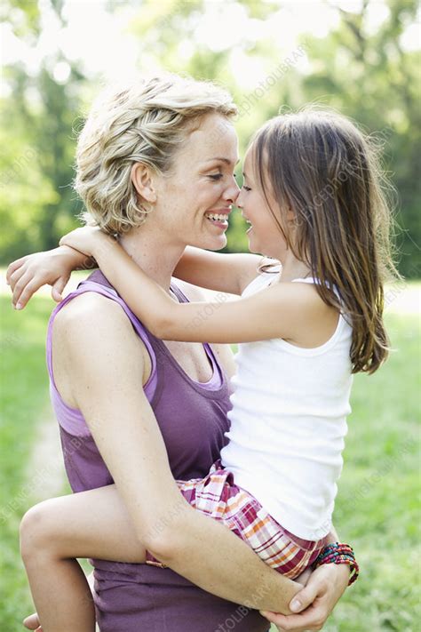 Mother And Daughter Hugging Stock Image F003 6259 Science Photo Library