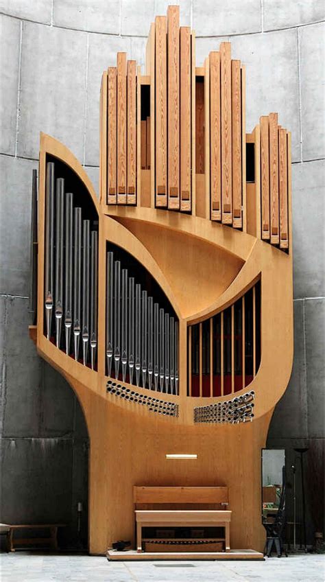 A Sculptural Pipe Organ Shaped Like A Hand In A Modernist French Alpine