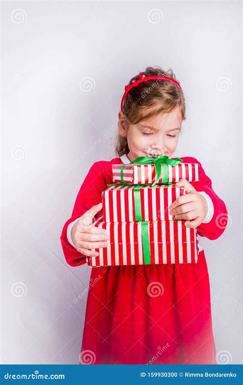 Happy Little Smiling Girl With Christmas T Boxes Stock Photo Image