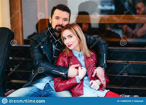 Beautiful Couple In Leather Jacket Handsome Man Hugging And Kissing