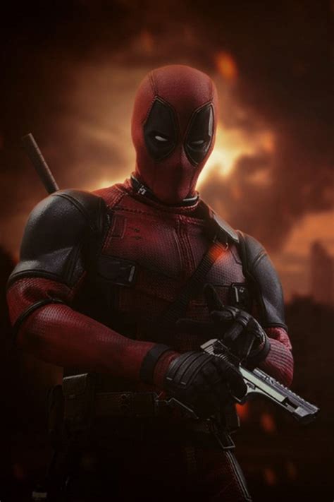 A Deadpool Character Holding A Knife In His Hands