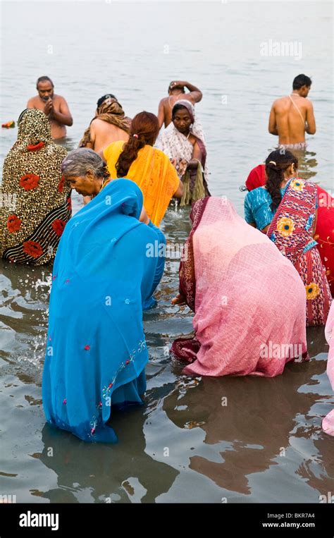 Pilgrims Bathing In The Holy Water Of Gangasagar Island In West Bengal
