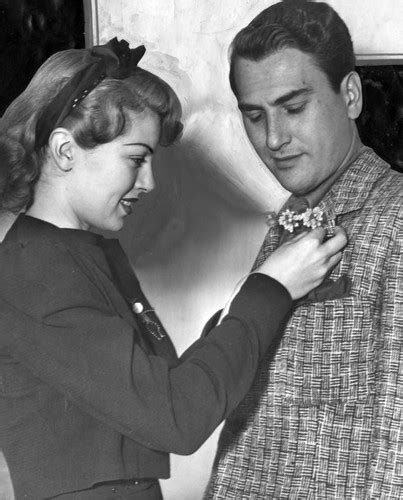 Lana Turner Pins A Boutonniere On Artie Shaw — Calisphere